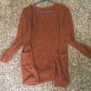 Orange polyester/cotton cardigan with pockets